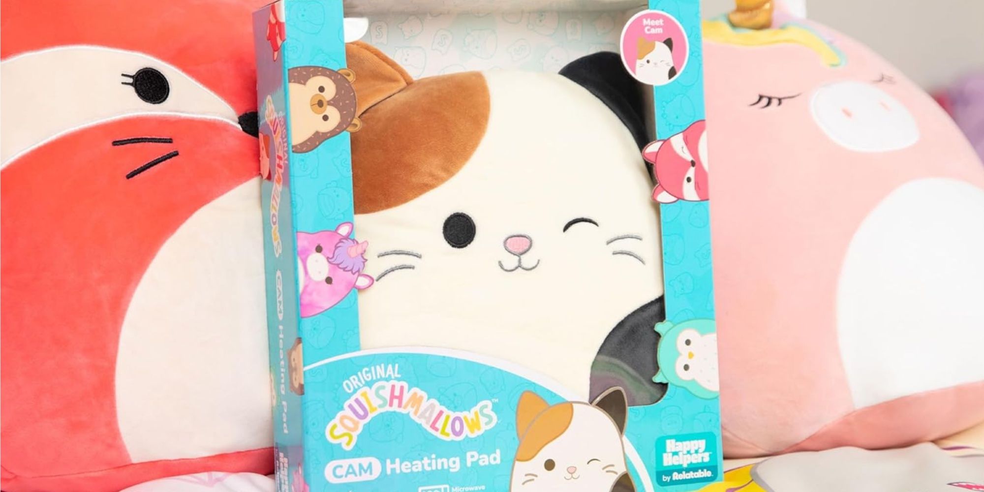 Squishmallows heating pad box next to other Squishmallows