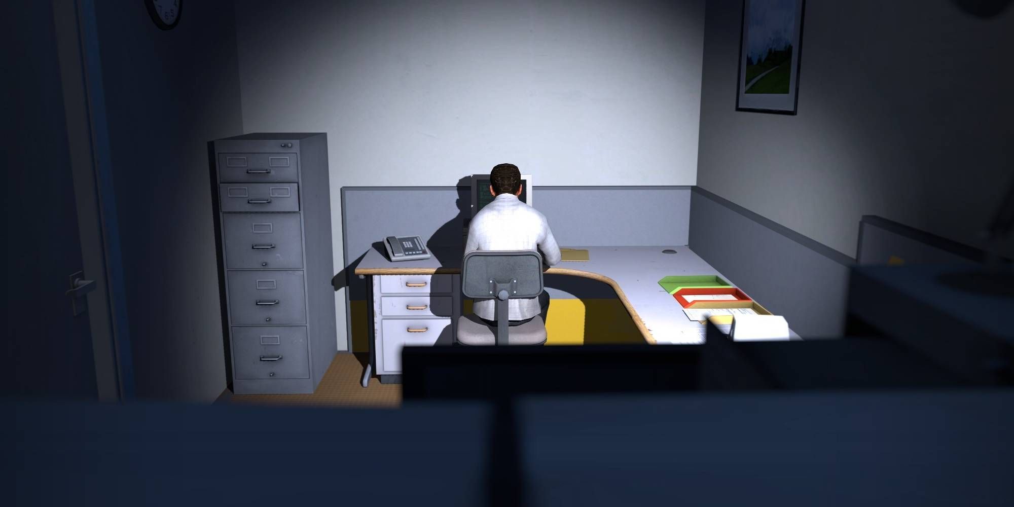 In Stanley Parable sitzt eine Figur in einem einsamen Büro