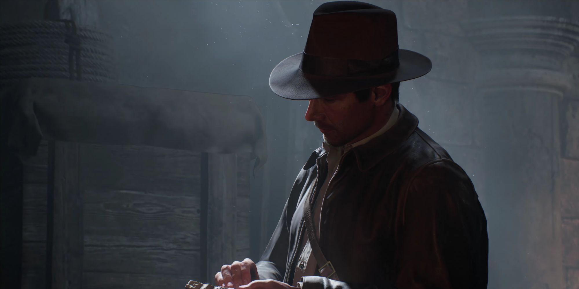 Indiana Jones taking notes in a notebook in The Great Circle.