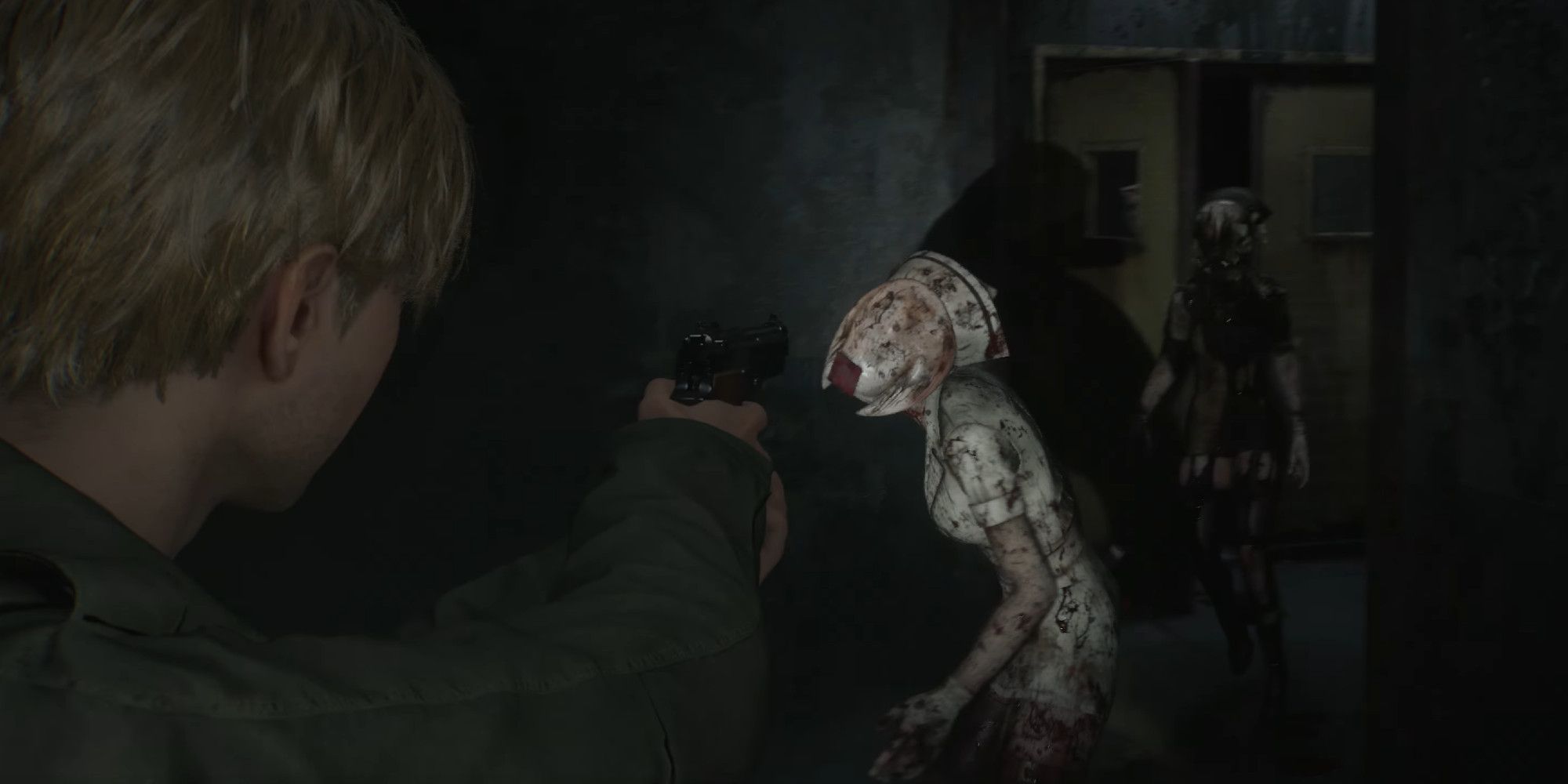 James Sunderland pointing a pistol at a nurse monster in Silent Hill 2 Remake