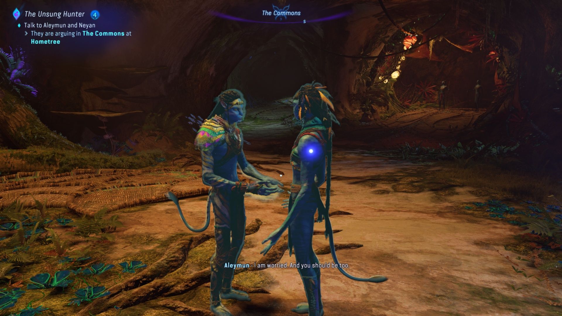 Aleymun und Neyan unterhalten sich im zweiten Stock des Hometree in Avatar: Frontiers Of Pandora.