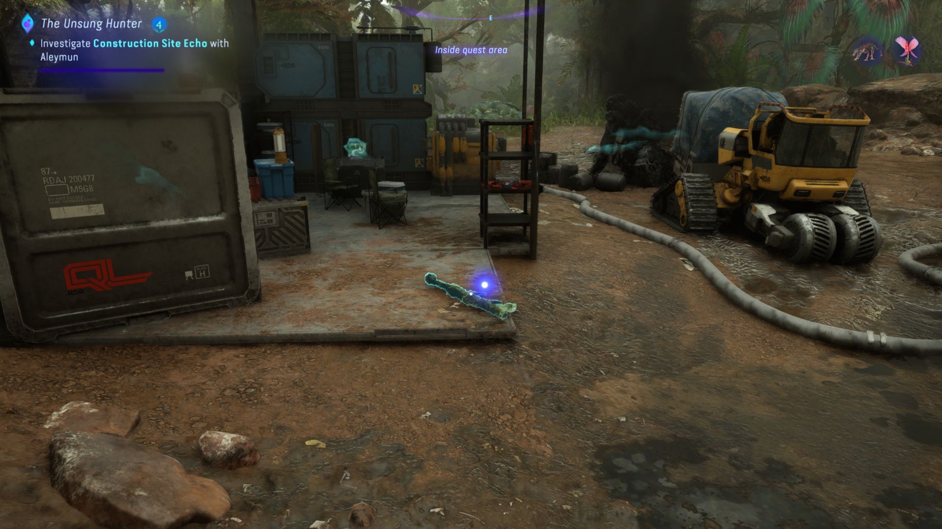 An RDA Launcher ont he ground near a computer in Construction Site Echo in Avatar: Frontiers Of Pandora.