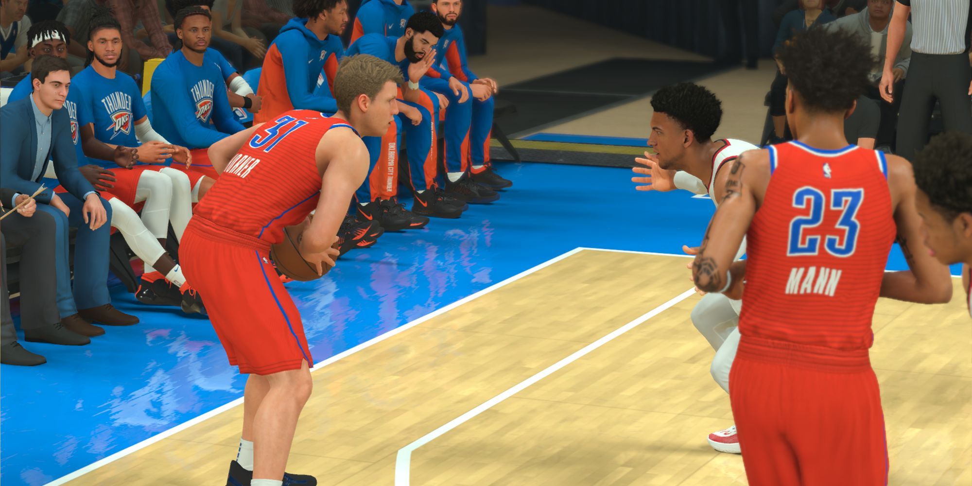 A custom MyPlayer holds the ball in a season game on NBA 2K24 while being guarded by an opponent.