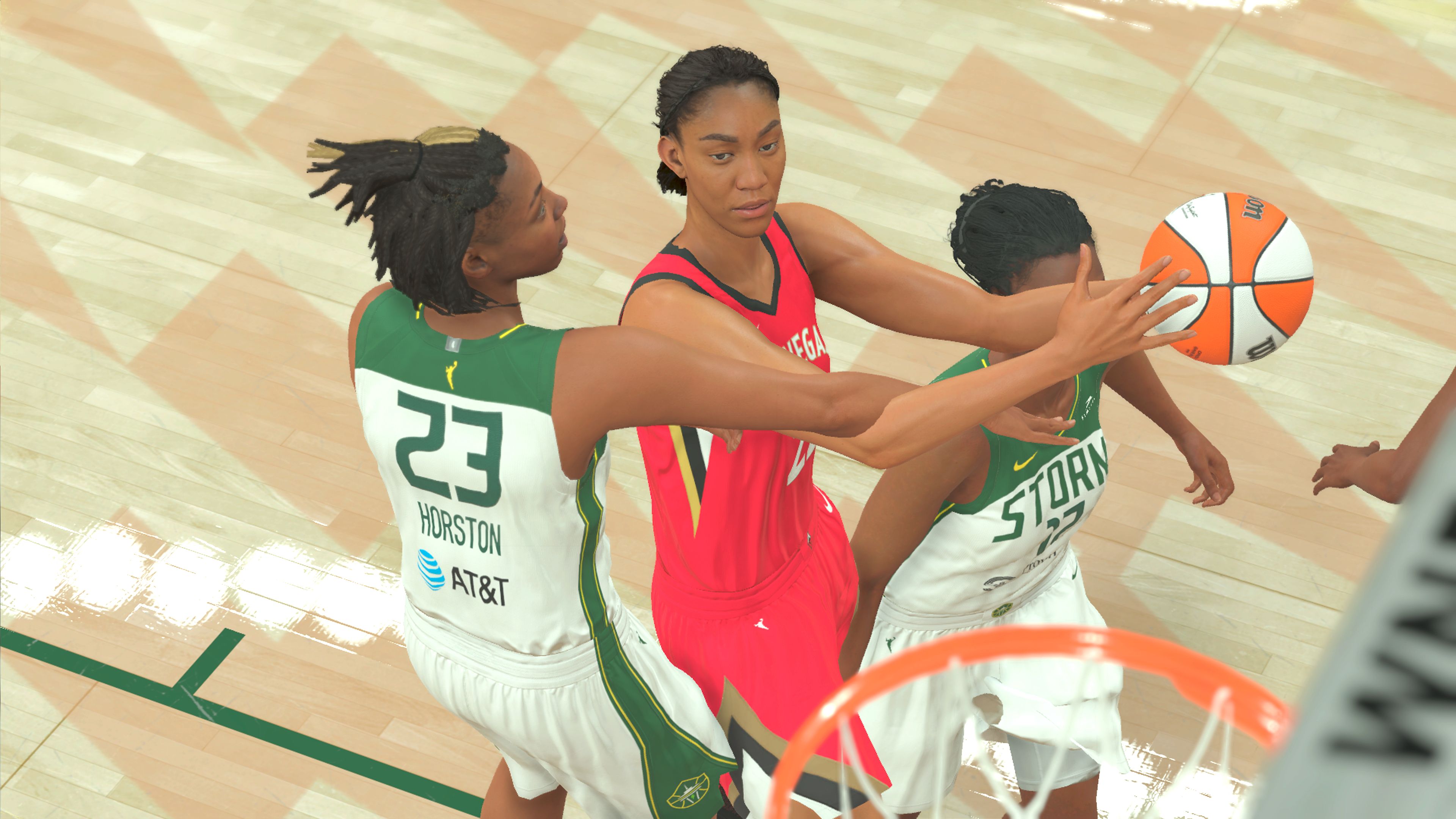 A screenshot of Las Vegas Aces star Aja Wilson going to the hoop from NBA 2K24.