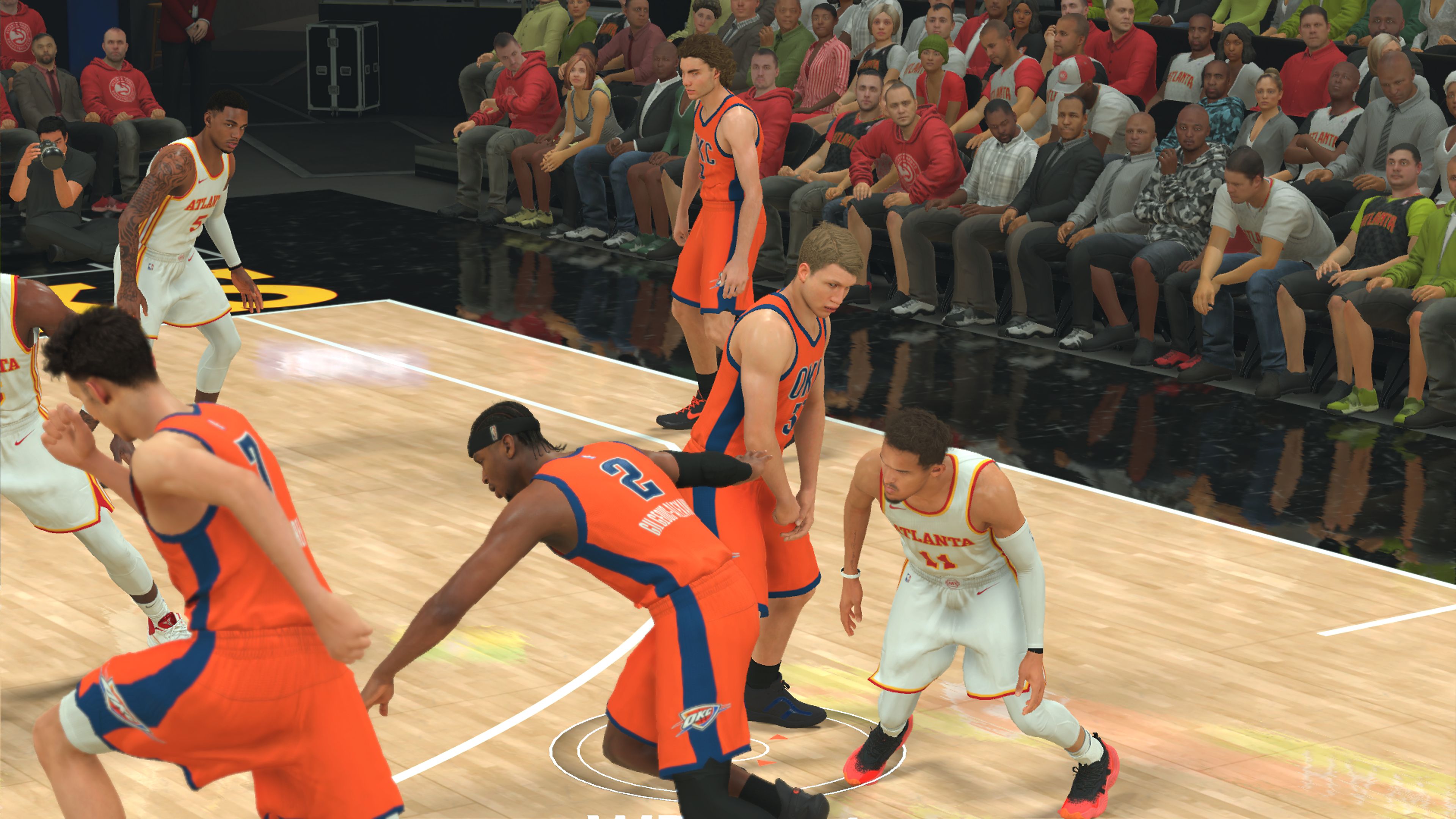A custom MyPlayer sets a screen for a teammate in a season game on NBA 2K24.