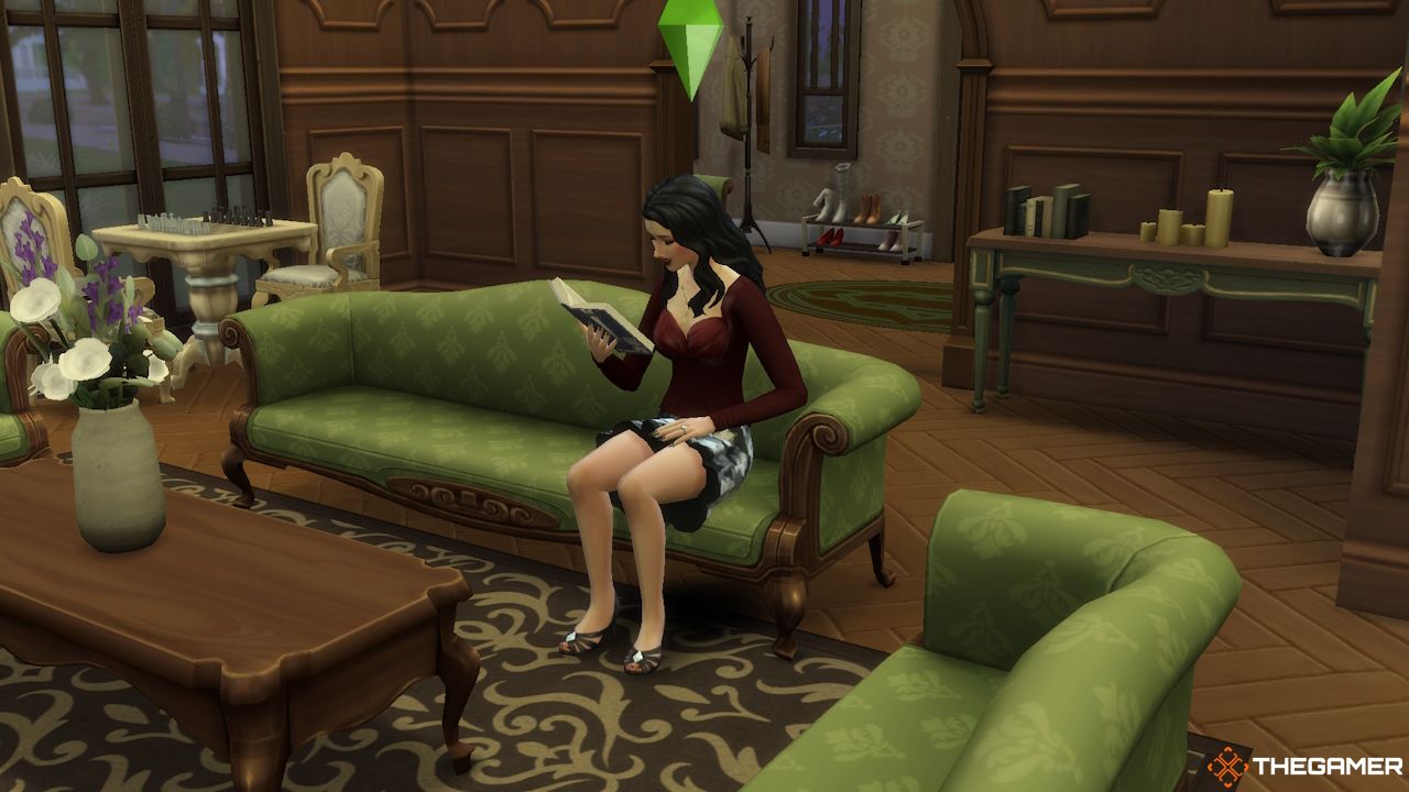 A female Sim reads in a mansion living room
