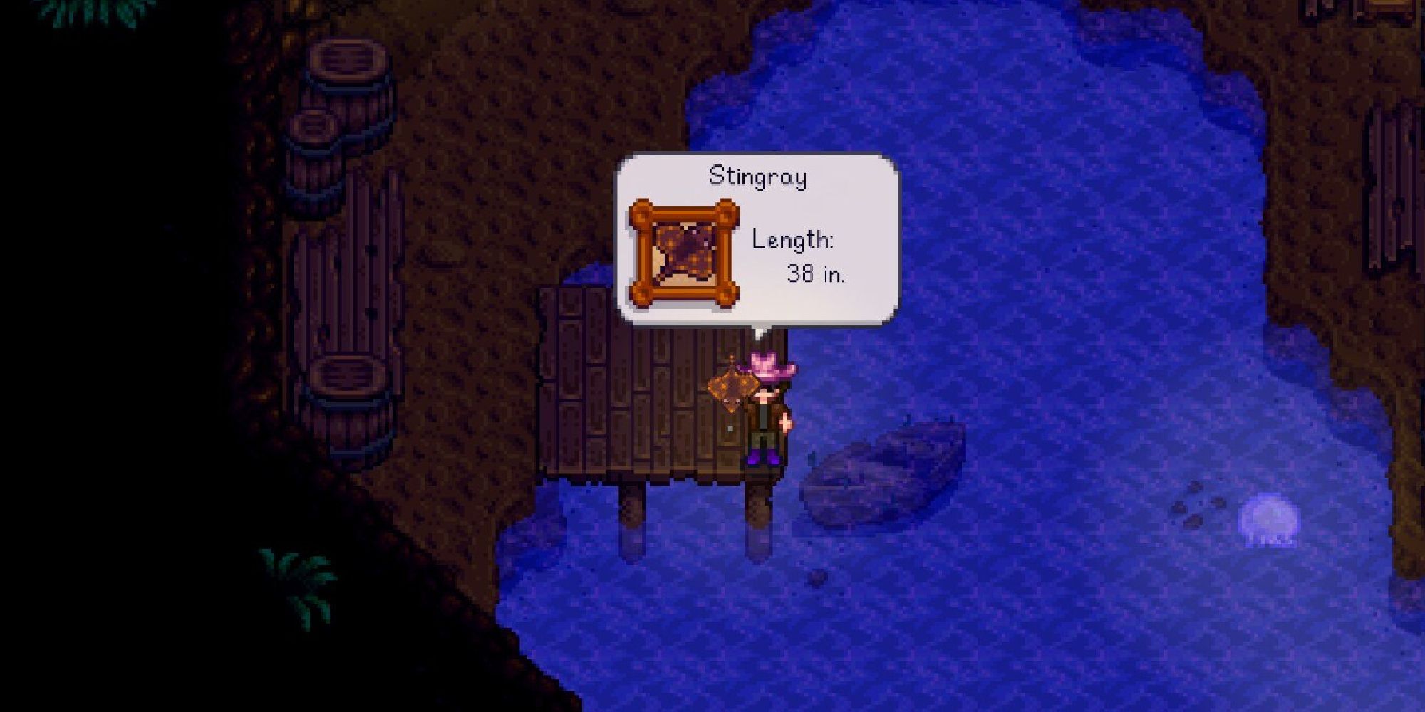 stardew valley player holding a stingray fish