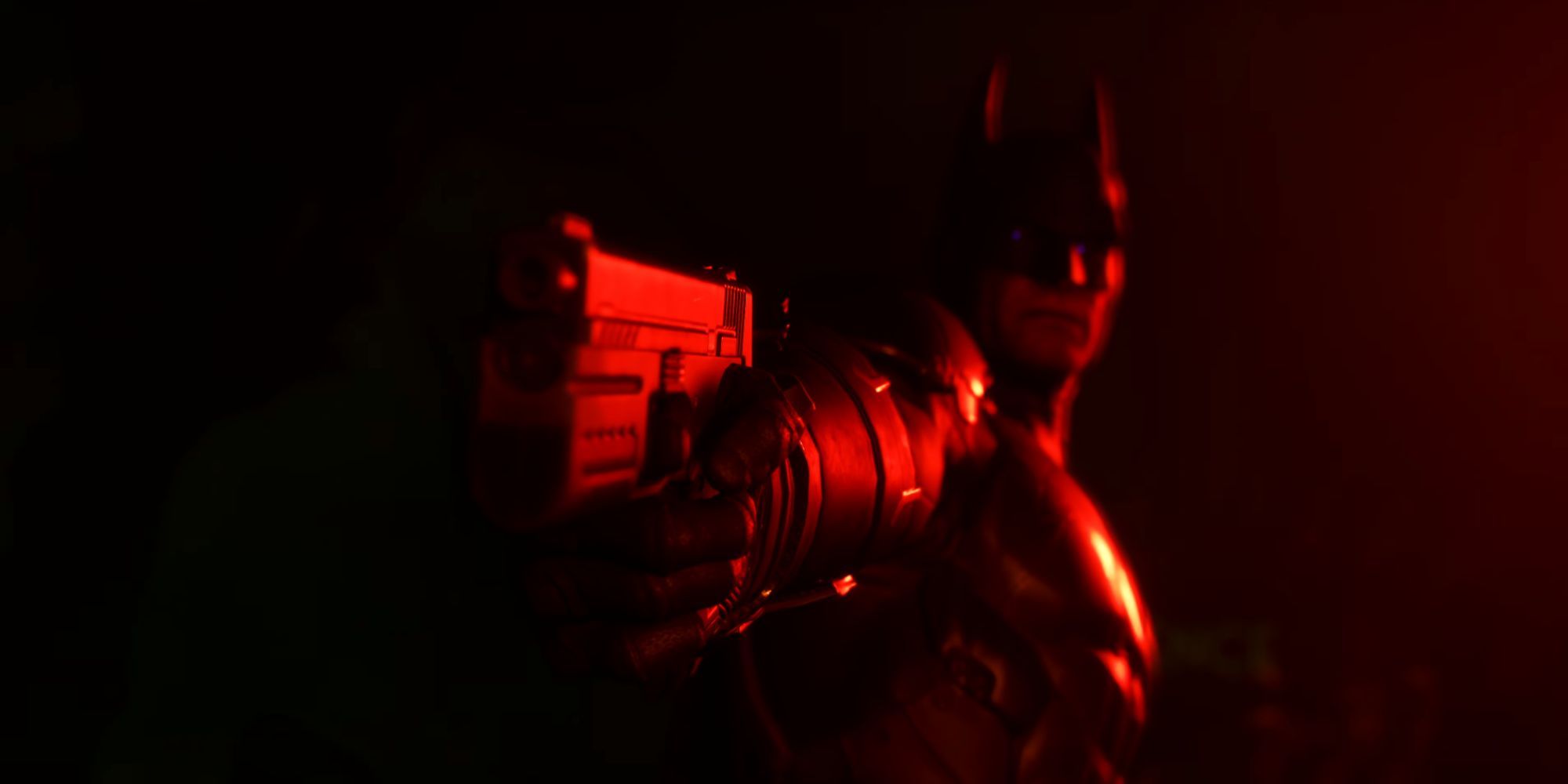 Batman holding a gun in Suicide Squad: Kill the Justice League in red lighting.