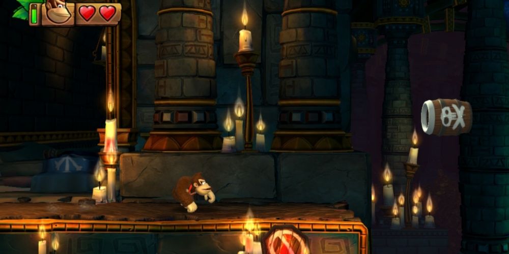 Donkey Kong going through a Temple level in Donkey Kong Country Tropical Freeze