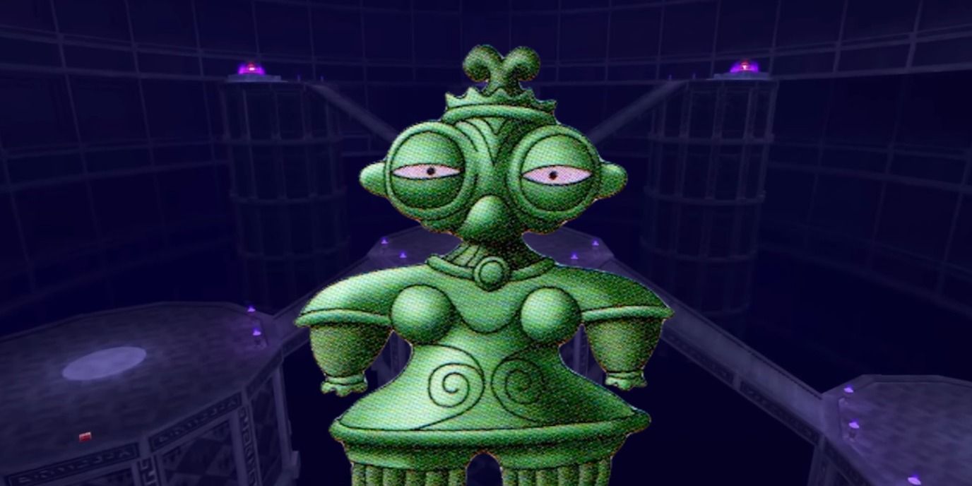 image of the graven idol which is a green doll looking figure