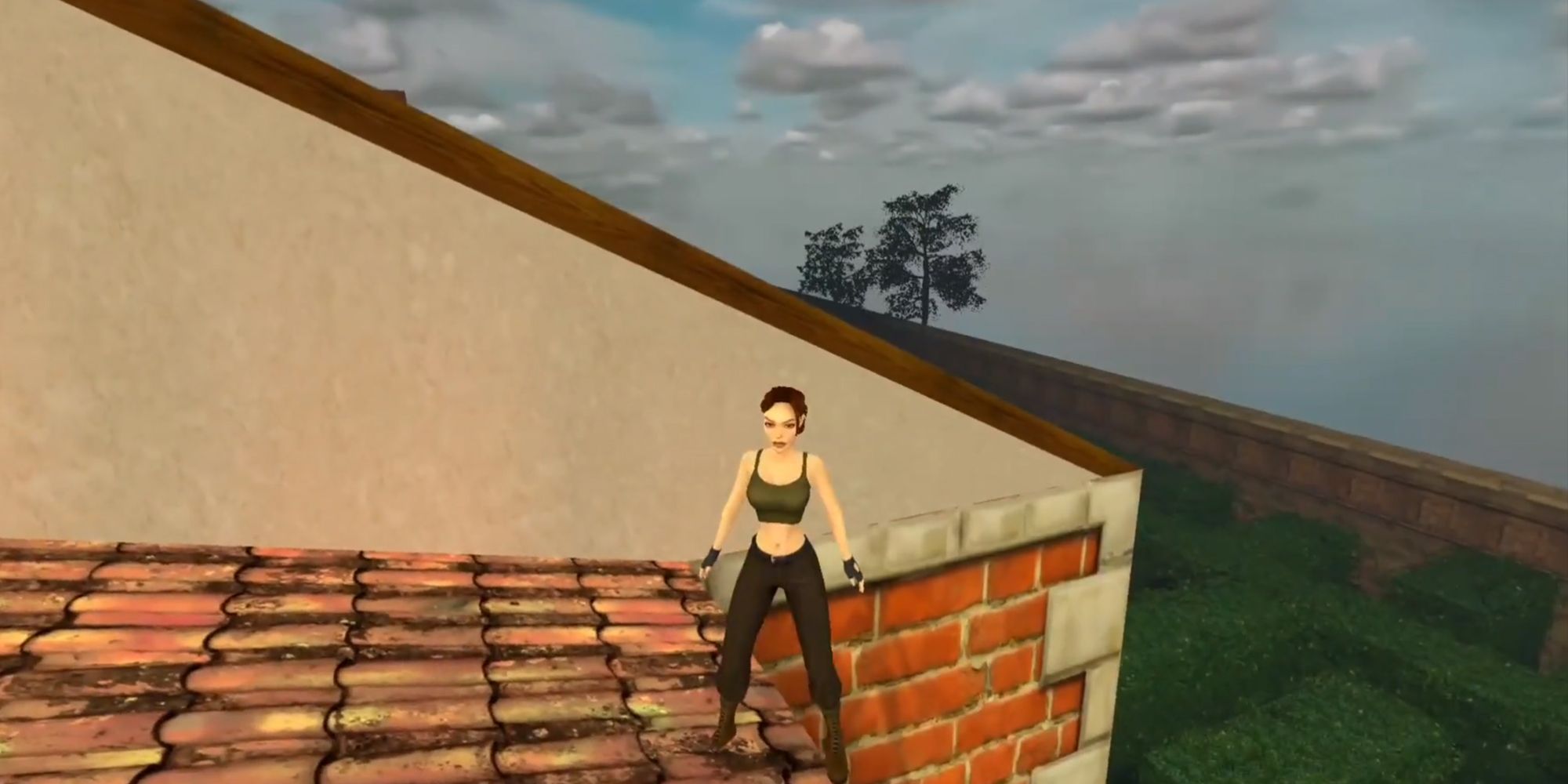 Lara Croft standing on the manor roof in Tomb Raider remastered