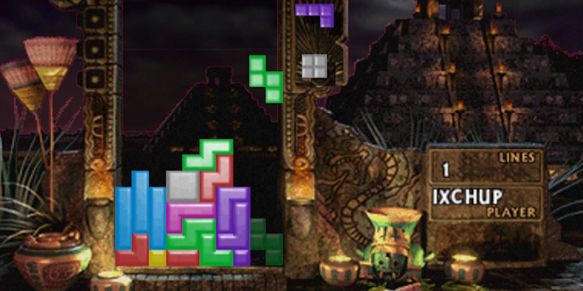 Tetrominoes falling in front of a temple in The New Tetris