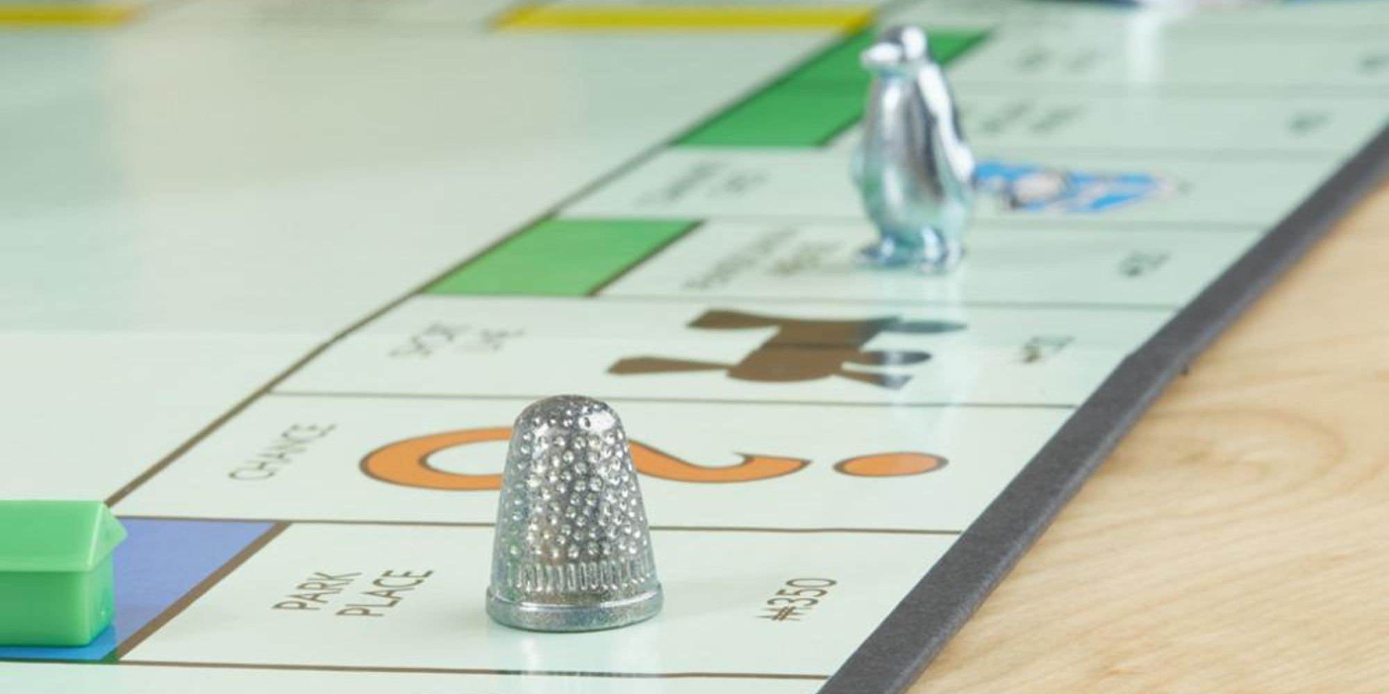 official hasbro image of monopoly thimble