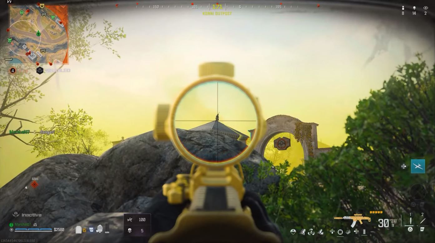 Someone shooting at an enemy from long range with a yellow gun in Call of Duty Warzone