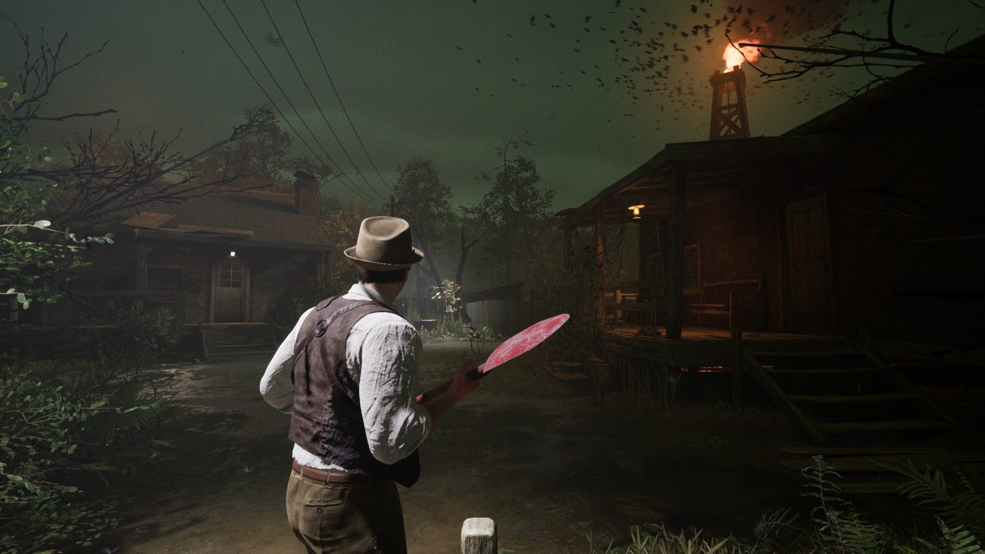 Edward holding a shovel by the Hateful Mound swamp houses in Alone in the Dark.
