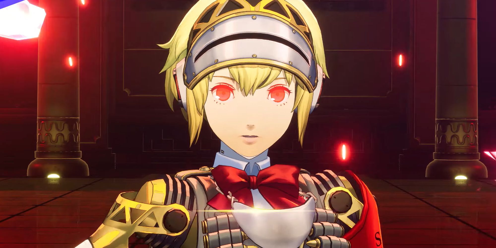A close up of Aigis with glowing red eyes in Persona 3 Reload Episode Aigis