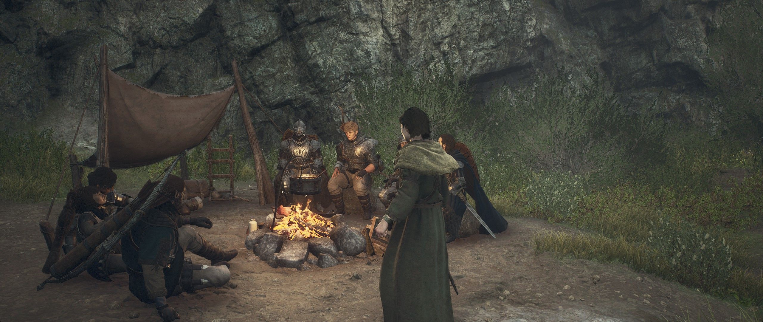 An arisen with lots of other characters around a campfire in Dragon&rsquo;s Dogma 2