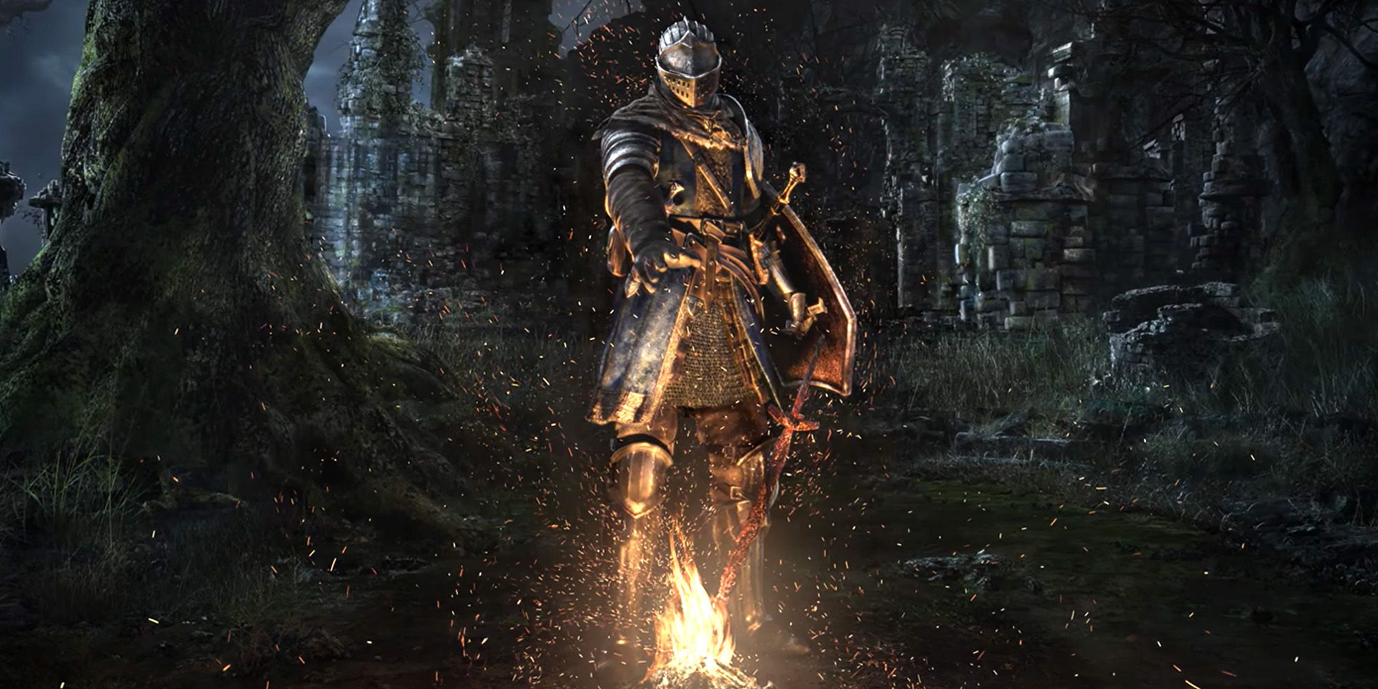 Dark Souls main character in knight armor lighting bonfire.