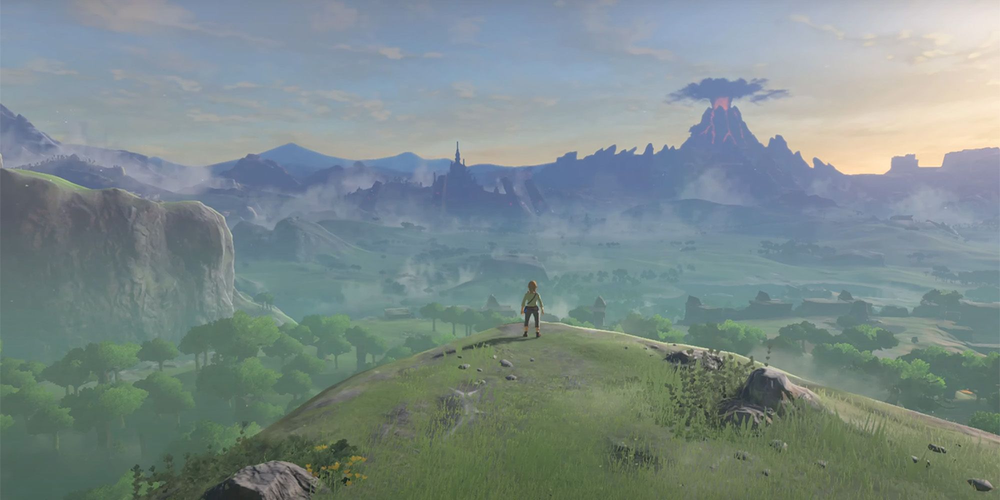 Link on a cliffside looking at Hyrule in The Legend of Zelda: Breath of the Wild