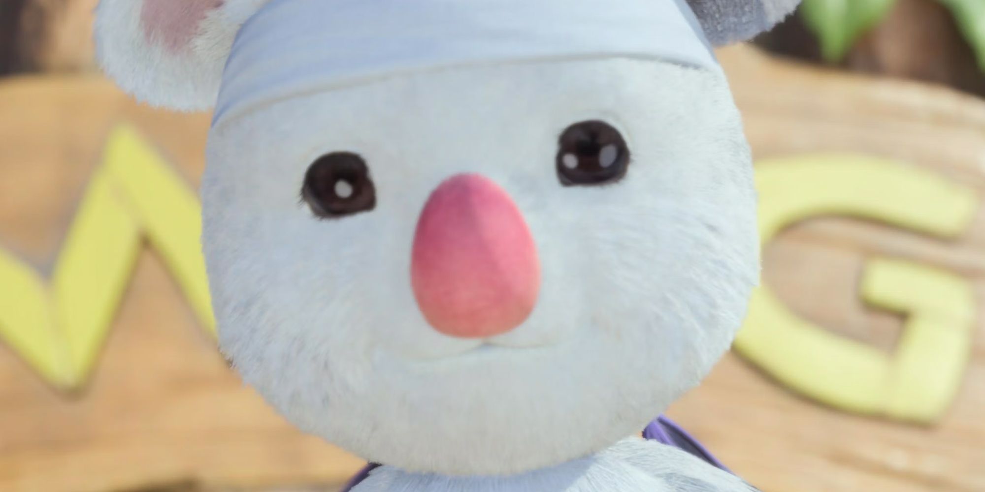 close-up of Final Fantasy 7 Rebirth moogle face staring at the camera in front of a wooden sign