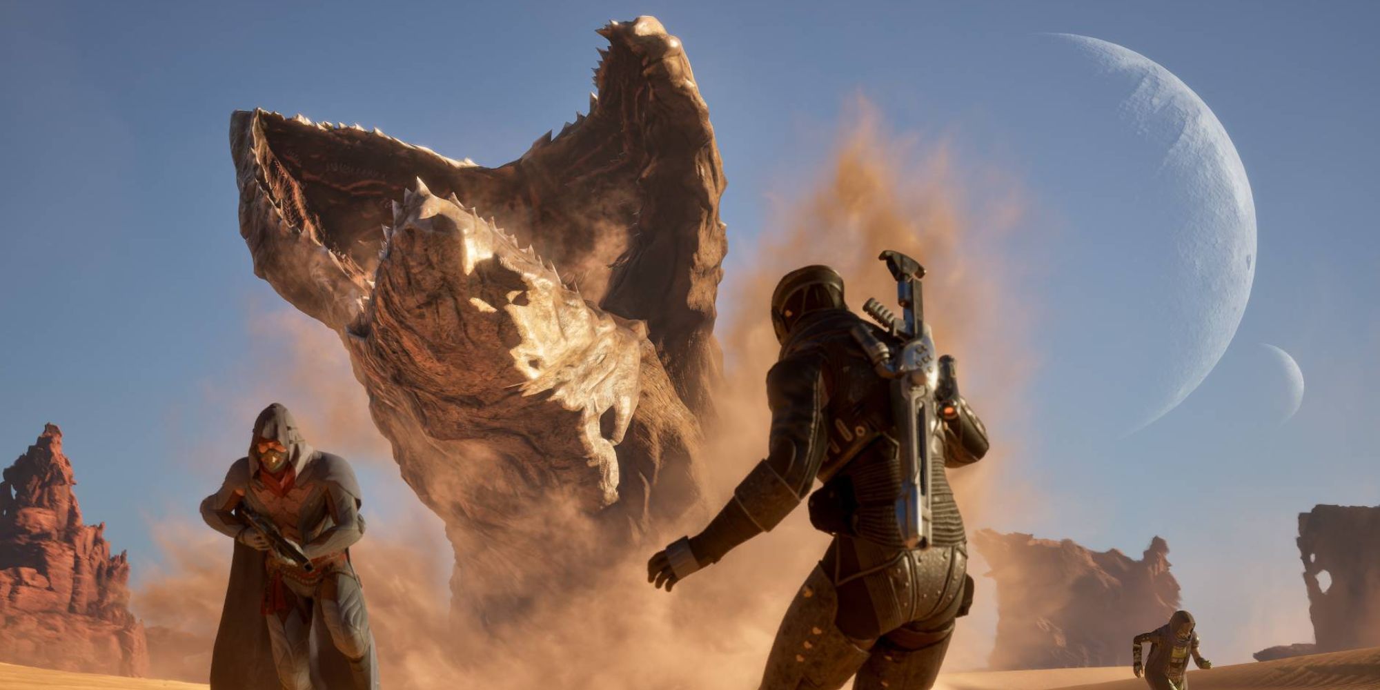 Two characters in Dune: Awakening taken by surprise as a sandworm appears from the ground