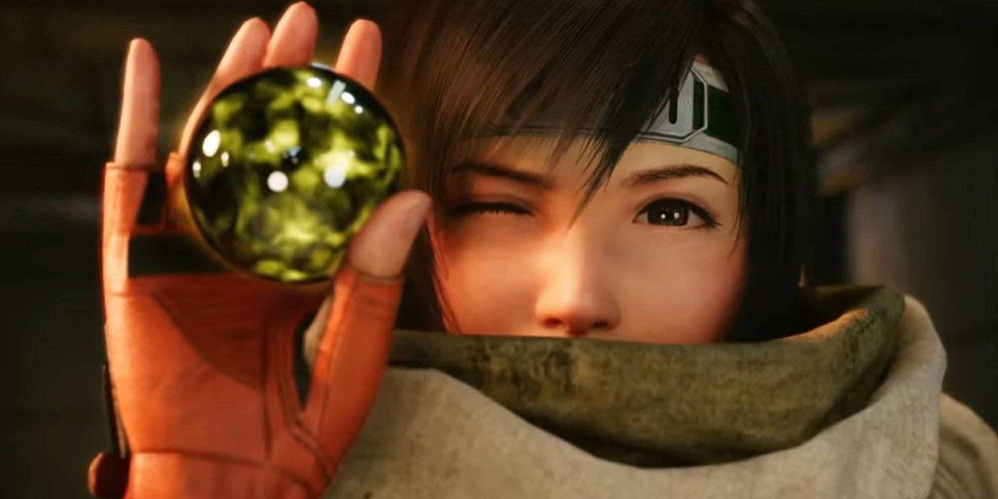 Yuffie holding up a piece of Yellow Materia while winking at the camera in Final Fantasy 7 Rebirth