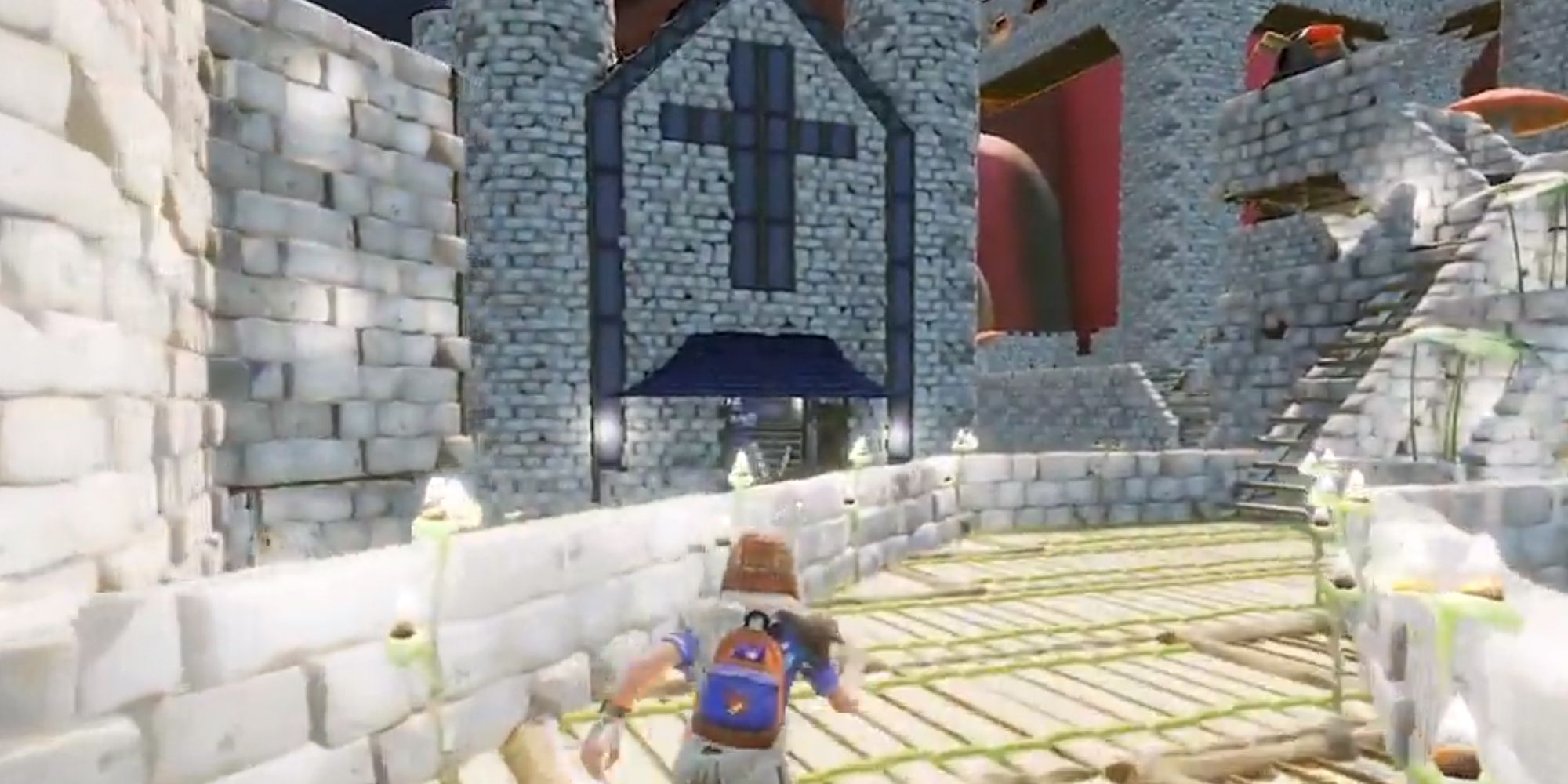 Grounded player running around their castle in front of a church building