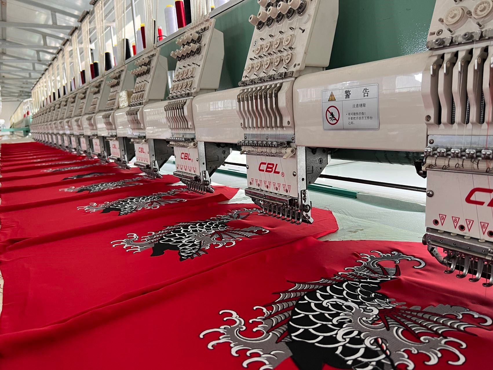 Insert Coin's Kasuga jacket being made in a factory.