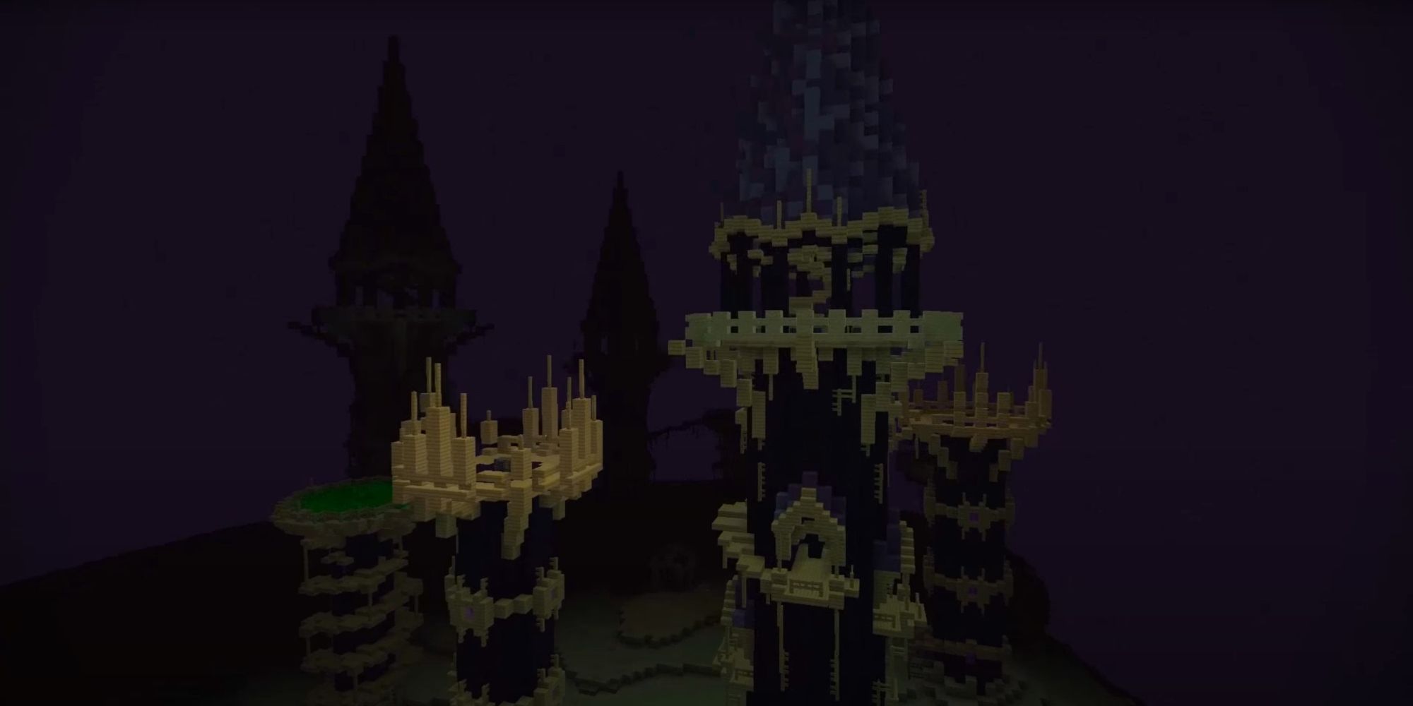 An image from Minecraft of End Towers turned into castles using Endstone.