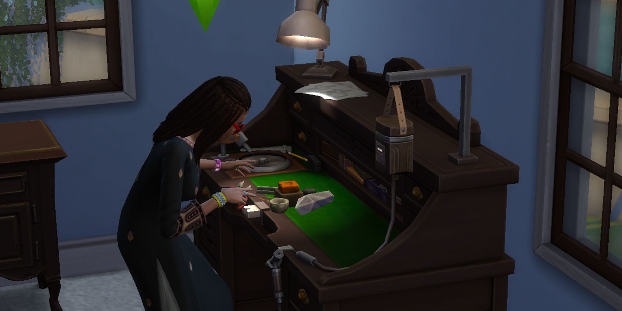 A sim crafting jewelry at the gem table