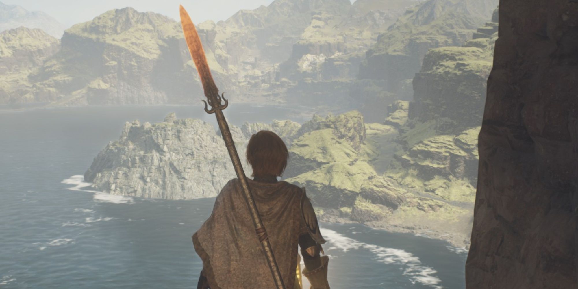 The Arisen looking out at the horizon from a tall tower in Dragon's Dogma 2