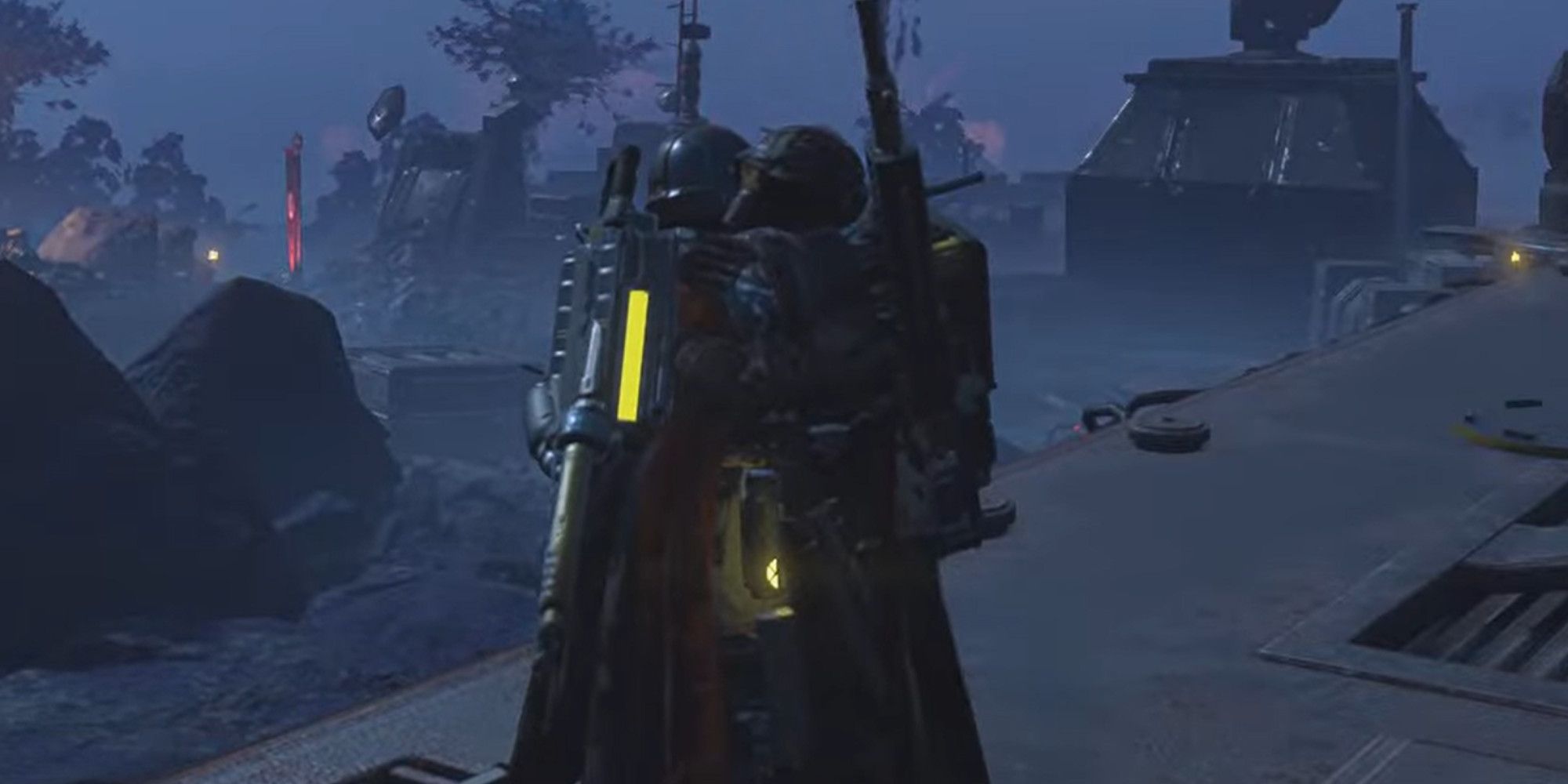 Two soldiers from Helldivers 2 hugging on top of a grey metal building
