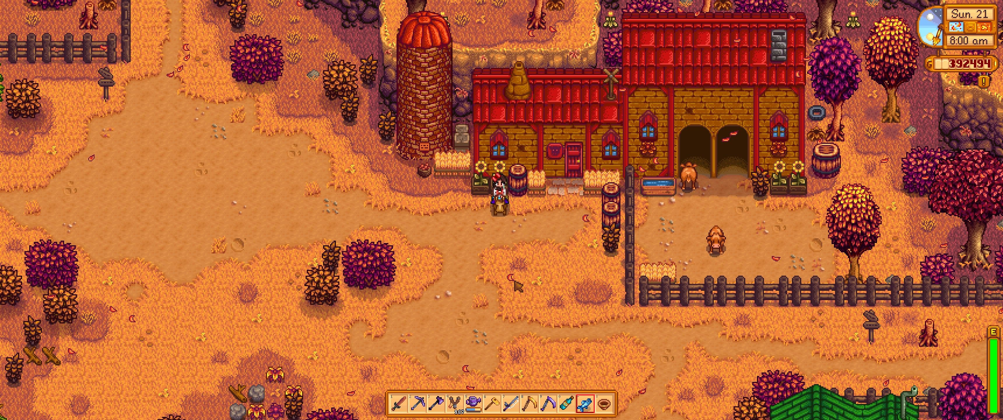 Stardew Valley: The player stands in front of Marnie's shop