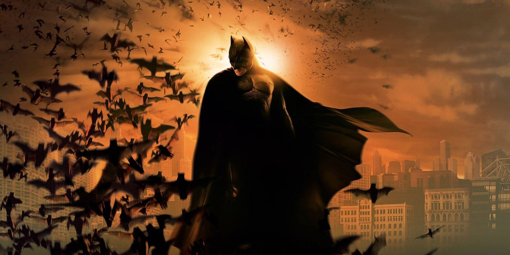 Christian Bale's Batman in the poster for Batman Begins.