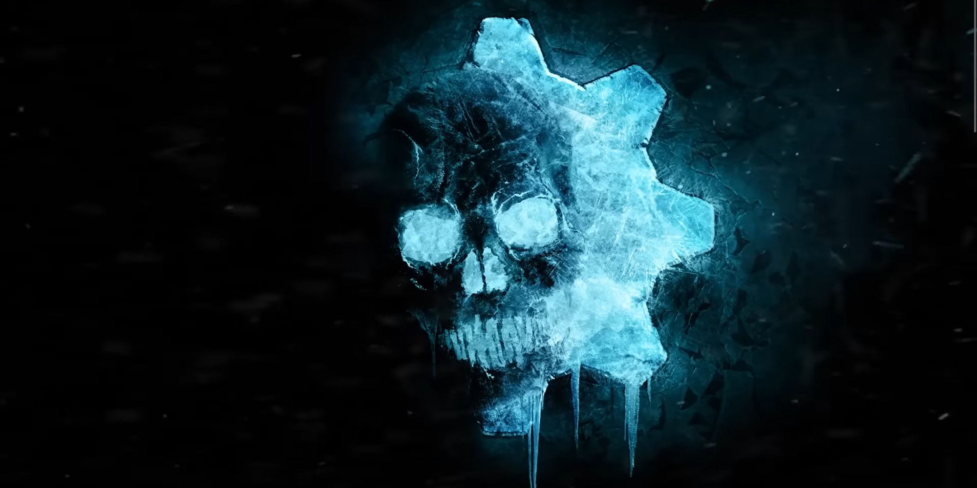 Gears of War logo made of ice on a black background while its snowing