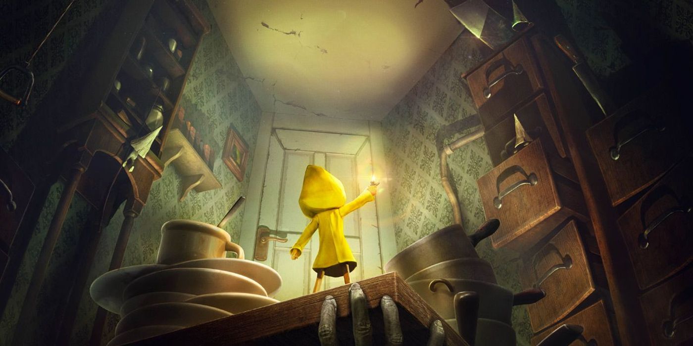 Little Nightmares child in a yellow coat in front of a large door.