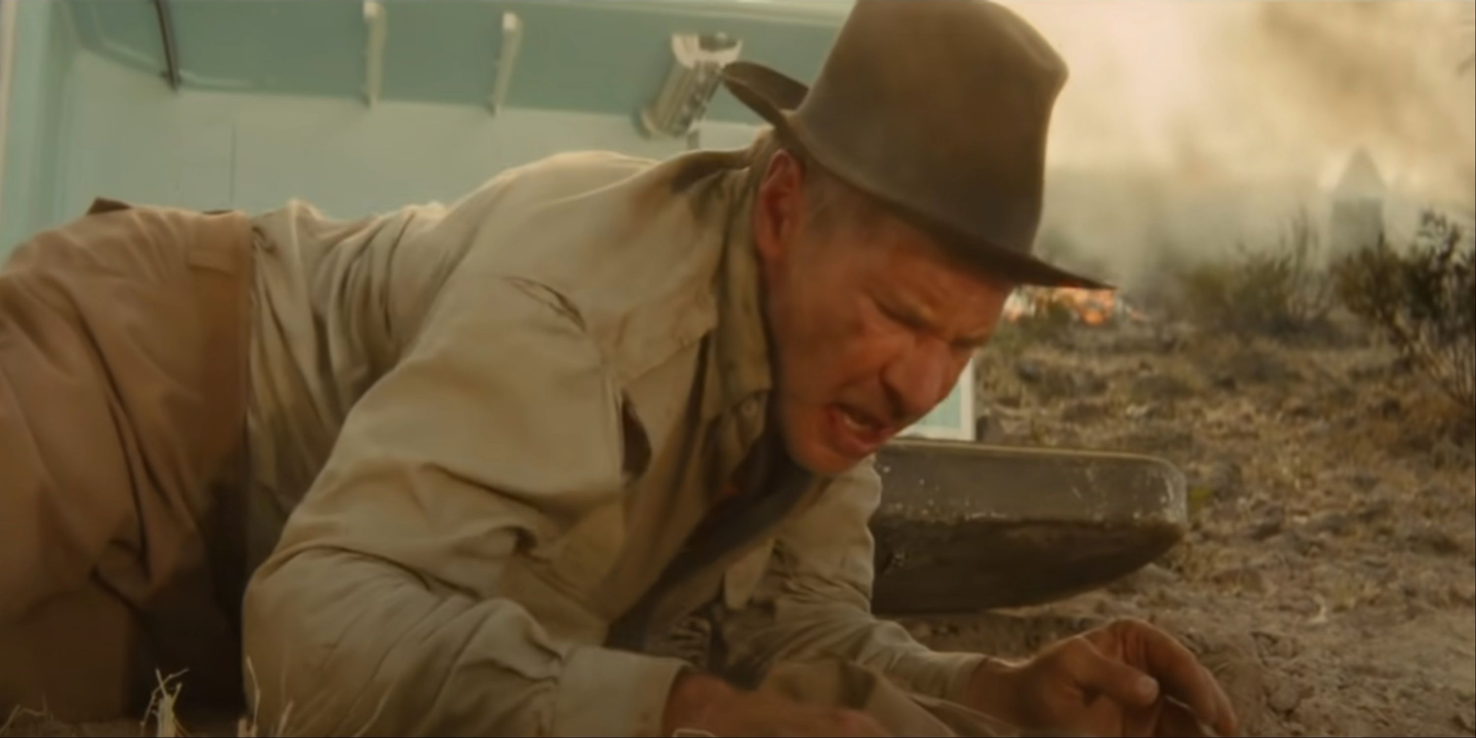 Indiana Jones emerging from the fridge after being carried away by the blast