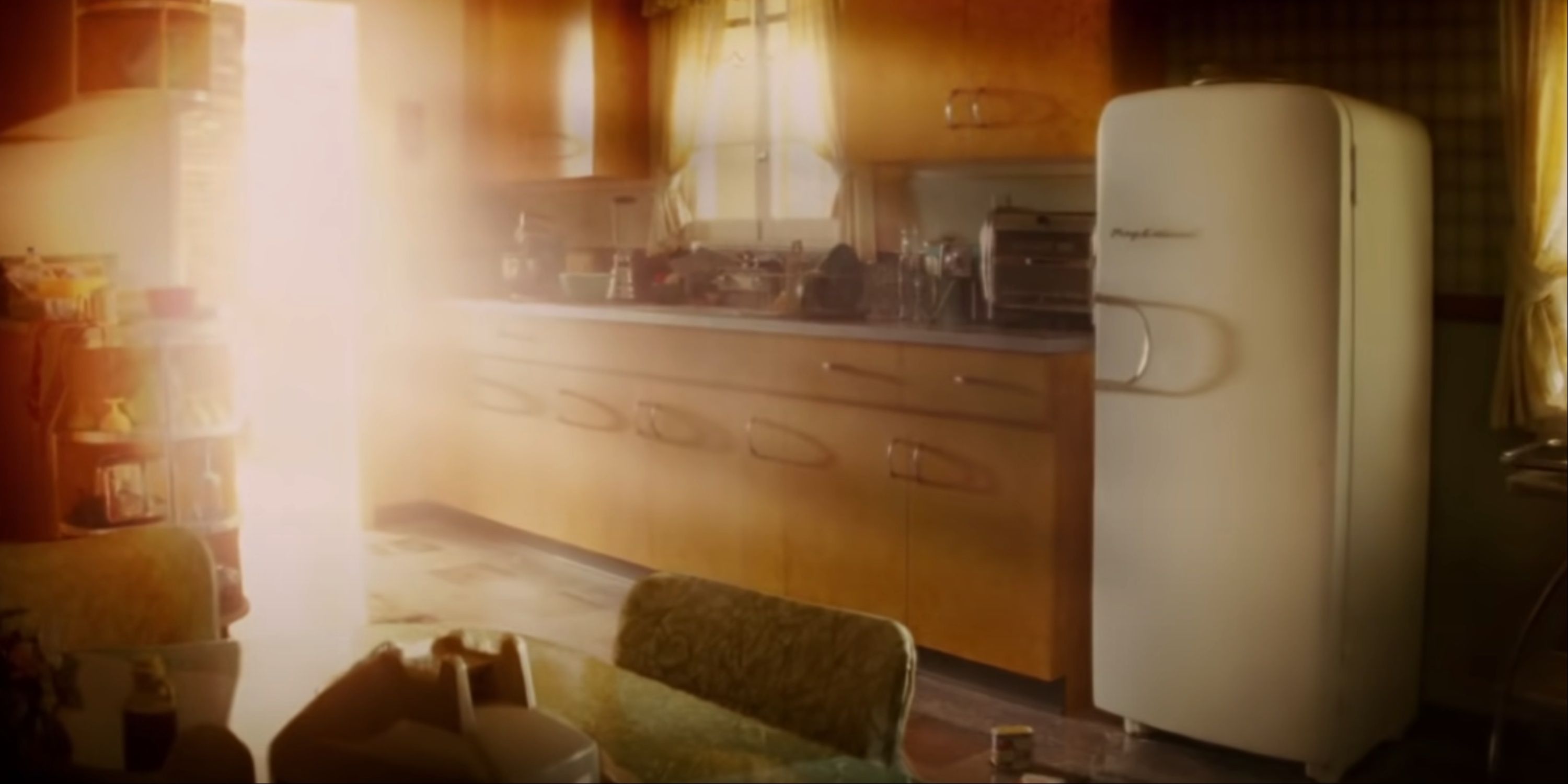 Indiana Jones locked inside of the refrigerator as the nuclear blast is visible through the kitchen door.