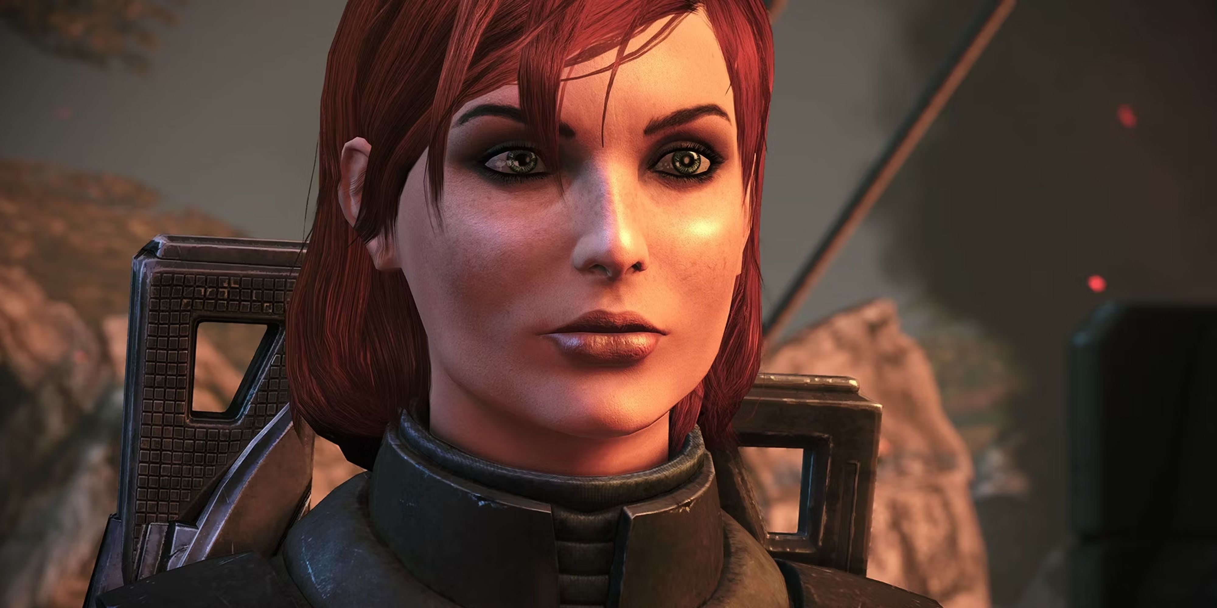 Mass Effect Female Shepard in combat armour standing in front of rocks and smoke