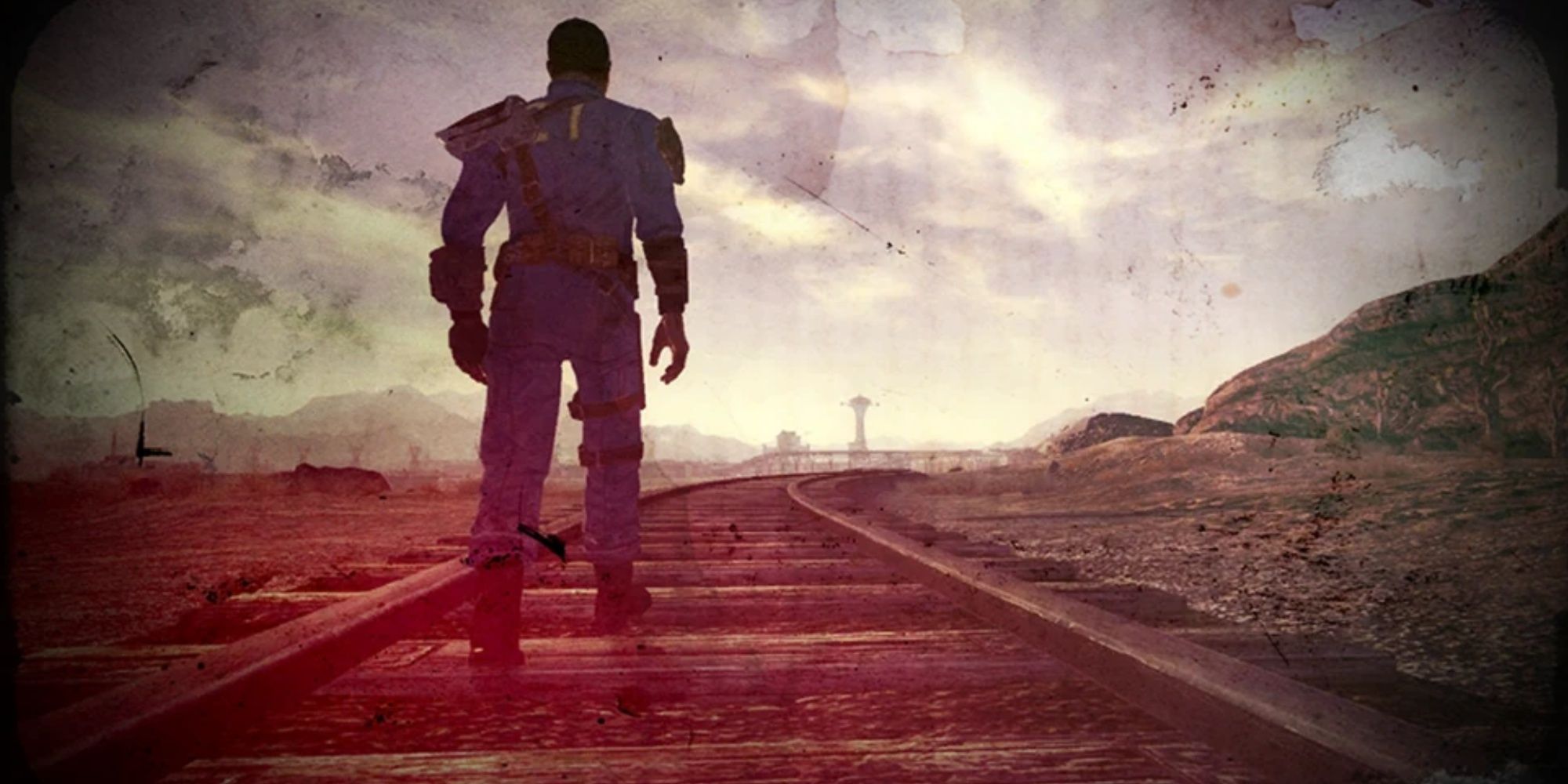 An ending slide from Fallout New Vegas, depicting The Courier walking along railroad tracks.
