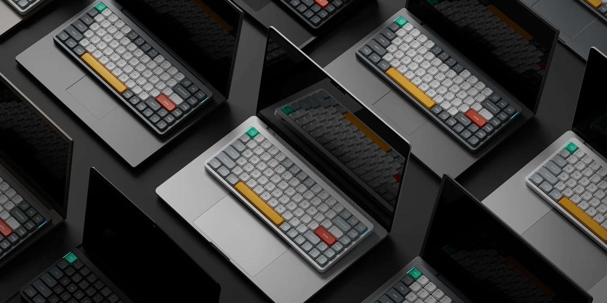 Nuphy Air75 v2 Promo Shot keyboards on top of macbooks lined up together