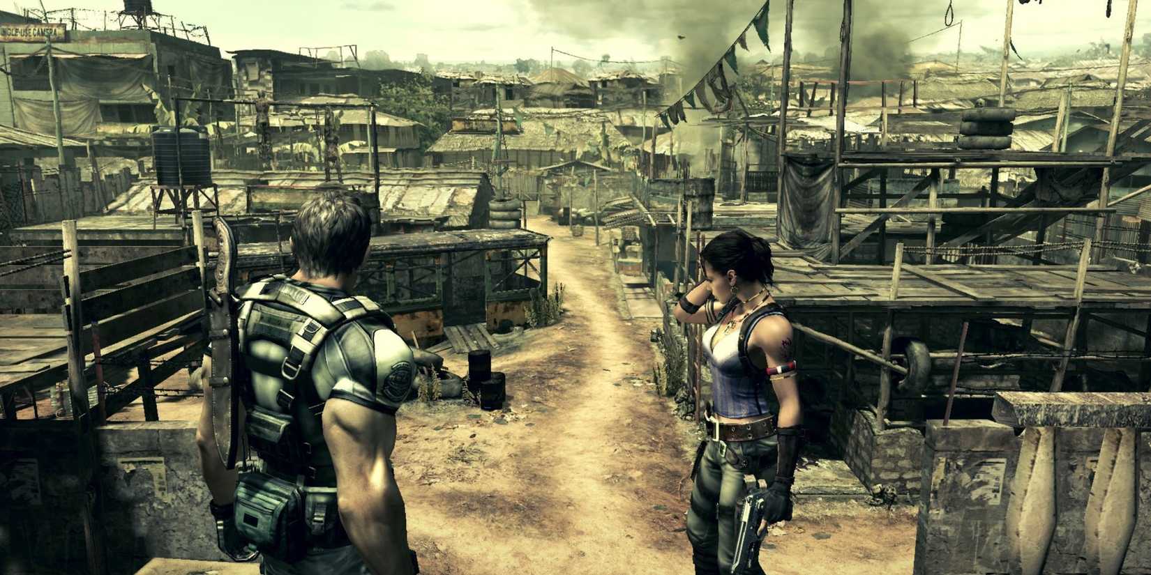Chris and Sheva in a ruined village in Resident Evil 5.