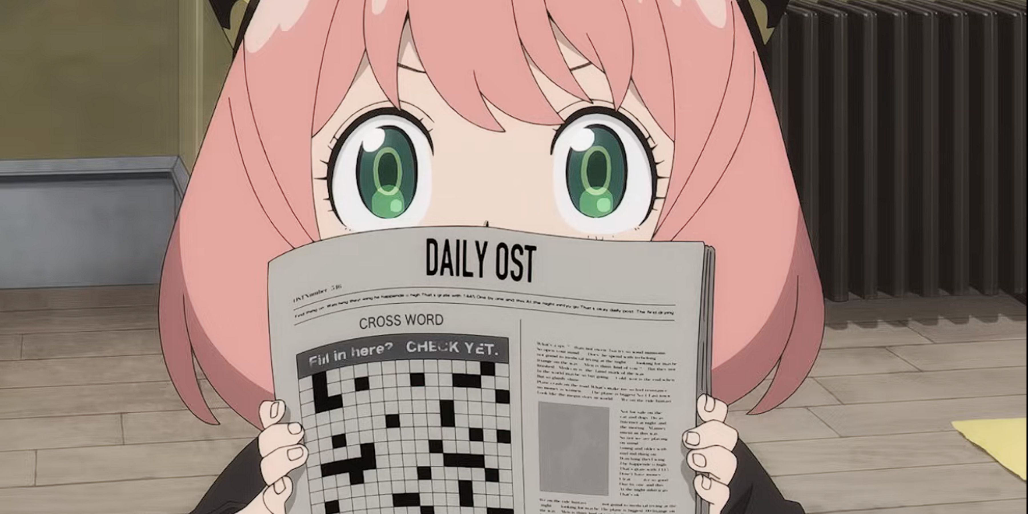 Image of Anya from Spy x Family holding up a newspaper crossword