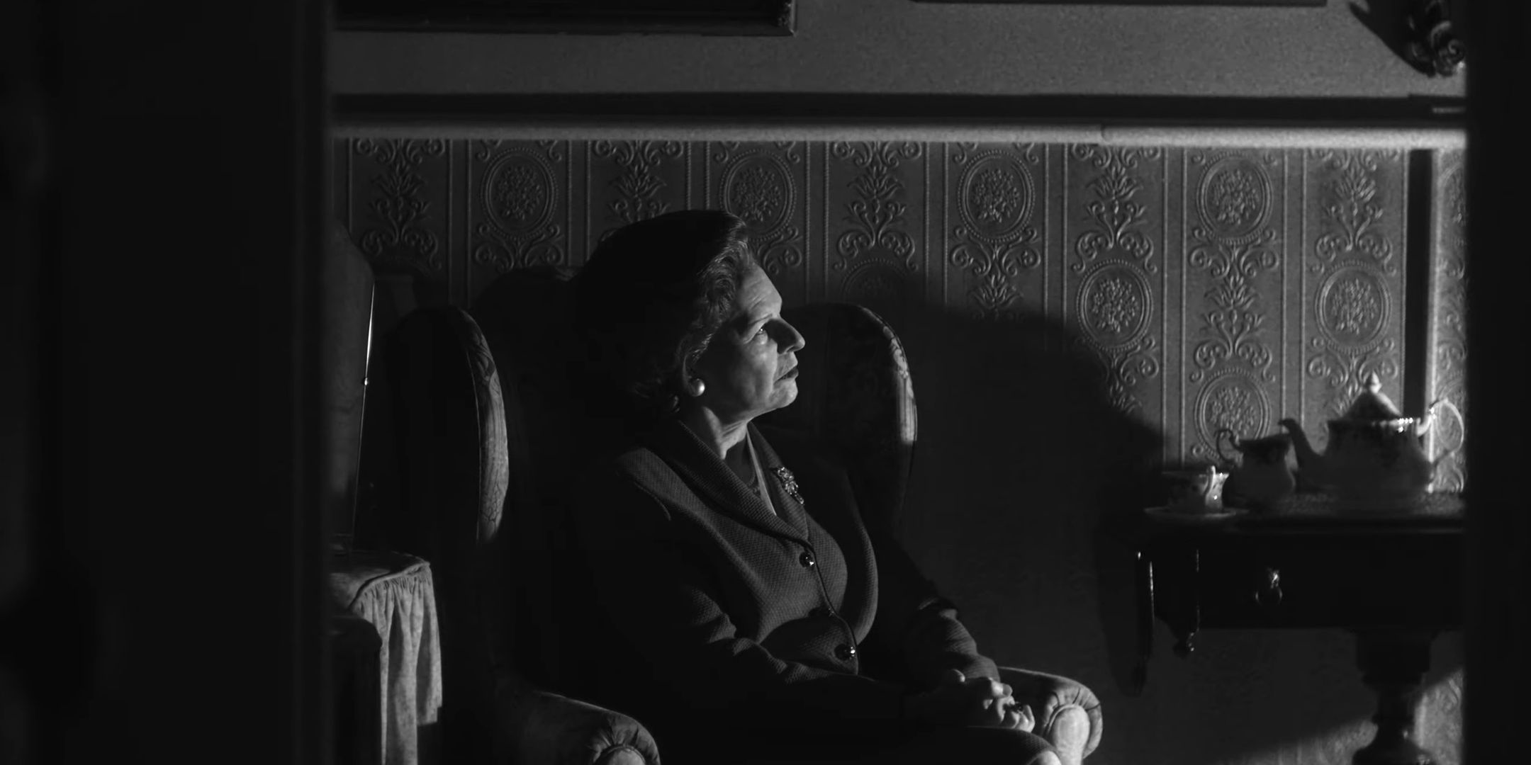 Black Ops 6 live-action trailer Margaret Thatcher sitting in a chair in black and white