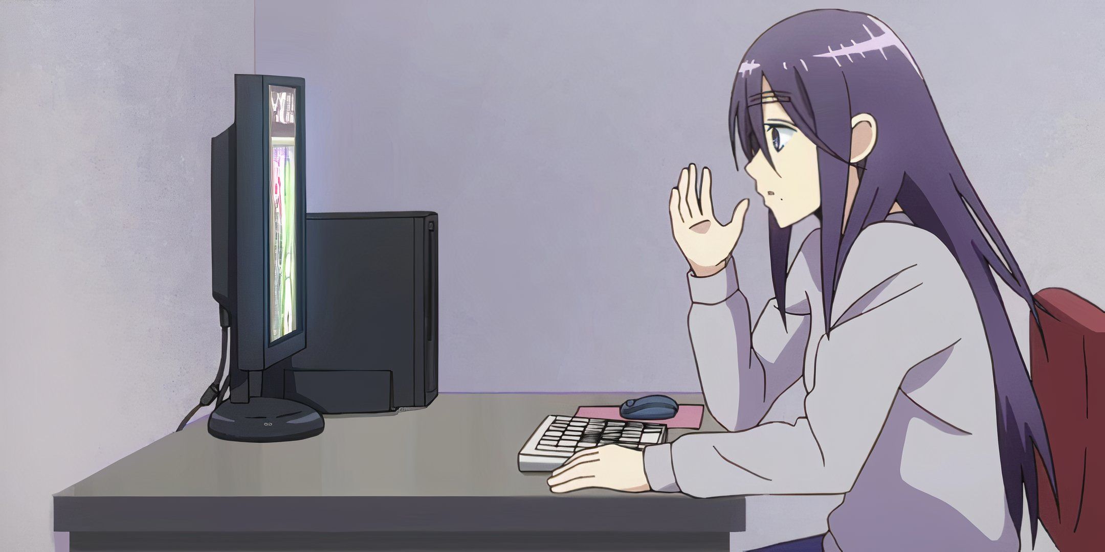 Morioka Moriko sits at her computer.