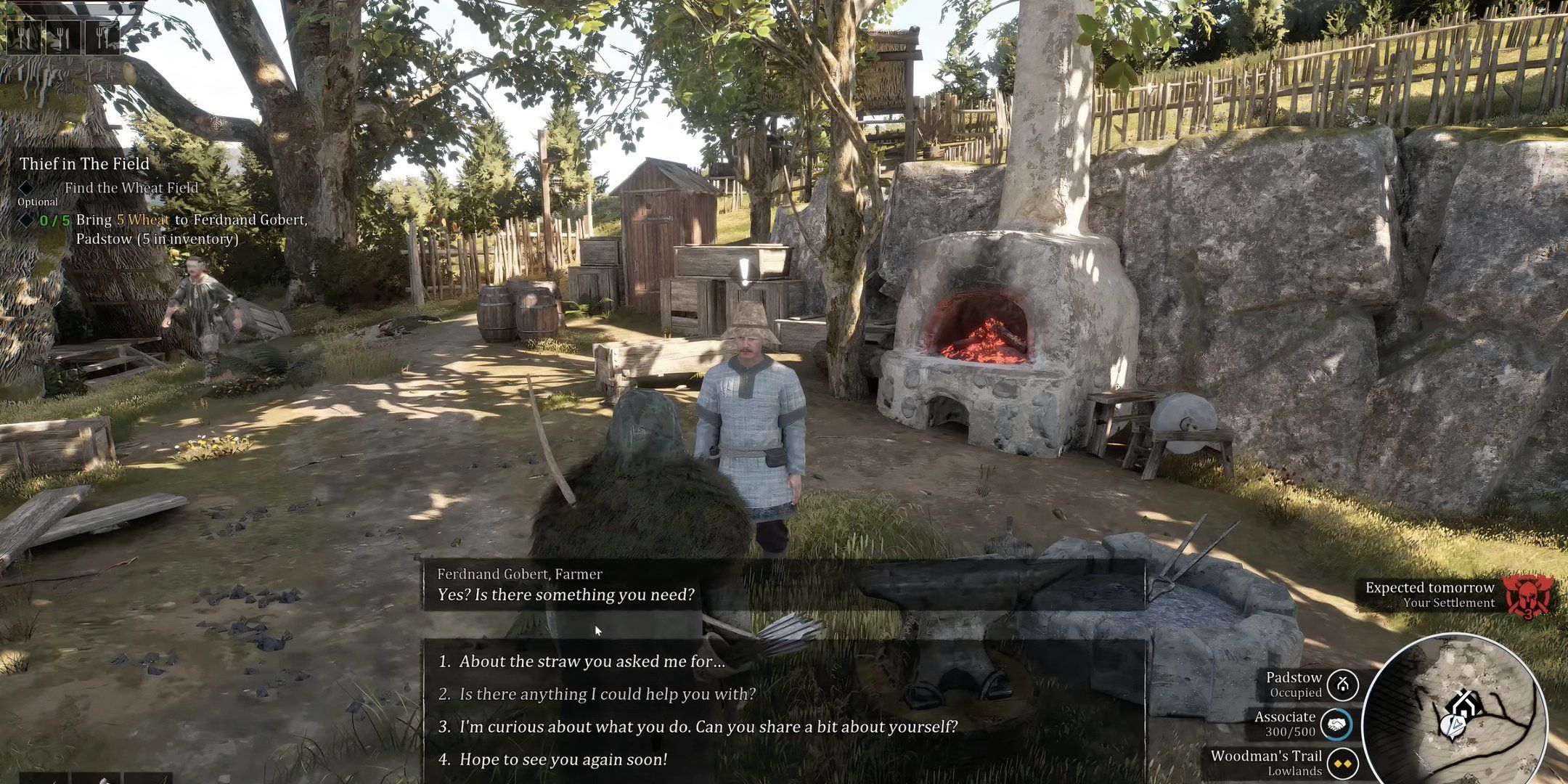 Farmer standing in front of the large oven