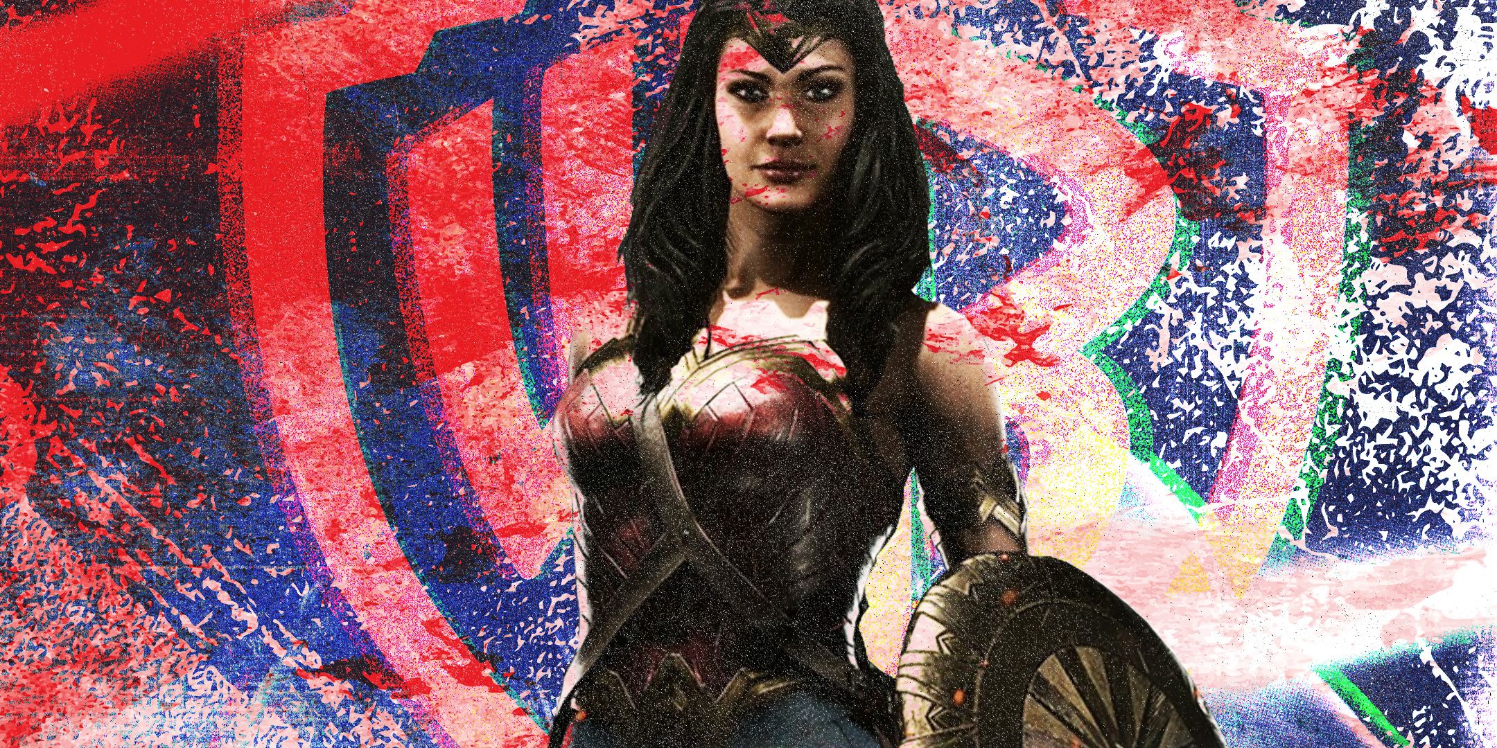 Wonder Woman holding her shield with the WB logo in the background