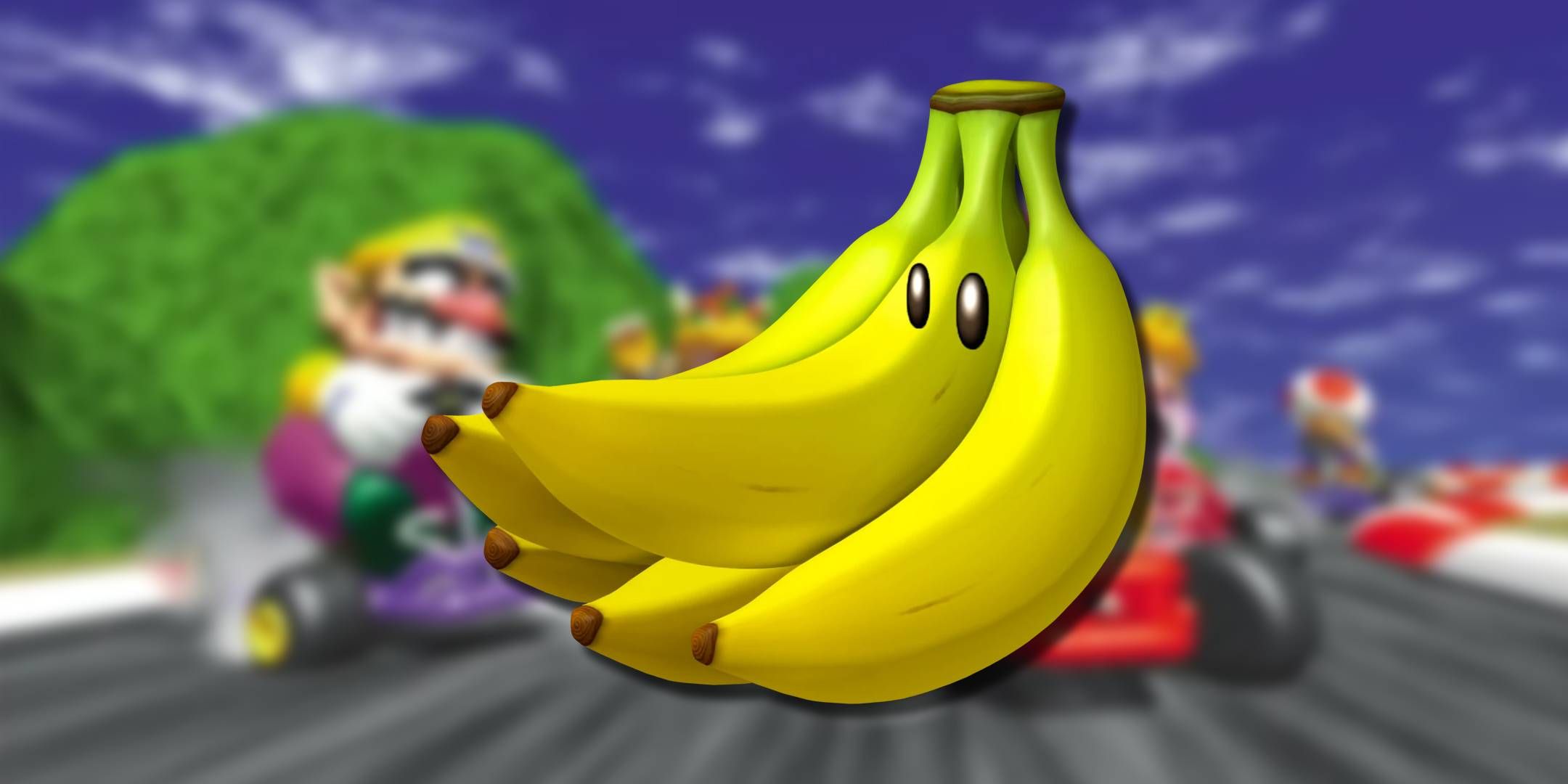 A Banana Bunch item from Mario Kart 64 in front of an image from the game