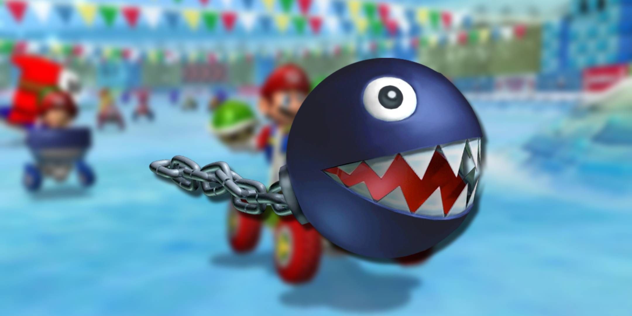 A Chain Chomp item from Mario Kart Double Dash in front of an image of Mario and Yoshi in a kart