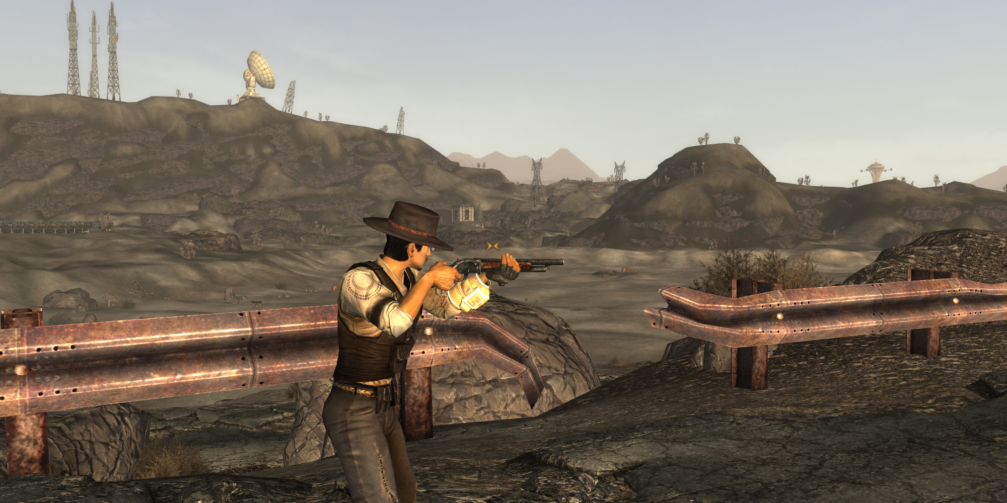 The Lone Wanderer in the desert aiming the Lever Action Shotgun in Fallout New Vegas.